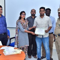 Selvi Karthikeyani  IFS Asst Conservator of Forest , Hosur Division handing over participation certificates